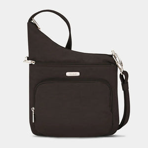 Travelon essentials crossbody bag with adjustable strap and multiple compartments, designed for convenient travel and everyday use.