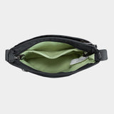 Travelon Roam small crossbody bag with adjustable strap and multiple compartments, shown in black fabric.