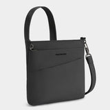 Travelon Roam Small Crossbody bag with adjustable strap and multiple compartments, shown in black fabric.