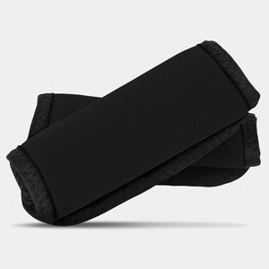 Travelon handle wraps in black, soft fabric with cushioning for comfortable grip and added protection on luggage handles.