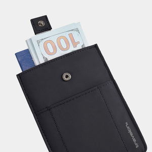 Travelon RFID pull-up passport wallet with multiple compartments and secure design, shown in black.