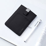 Black Travelon RFID pull-up passport wallet with multiple compartments for secure travel document storage.