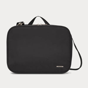 Travelon Complete Toiletry Bag with multiple compartments and zipper closures, designed for organized travel essentials.