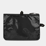 Travelon Seat Pack Organizer for travel essentials, showing compact storage with multiple compartments and secure straps.