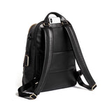 Tumi Voyageur Hannah leather backpack with adjustable straps and multiple compartments, stylishly designed for everyday use.