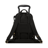 Tumi Voyageur Celina Medium Backpack in black fabric with leather accents, front zip pocket, and adjustable shoulder straps.