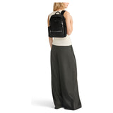 Tumi Voyageur Celina Medium Backpack in black with adjustable shoulder straps and multiple compartments for everyday use.