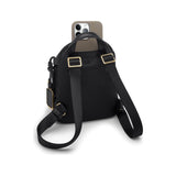Tumi Voyageur Celina Mini Backpack in sleek black with adjustable straps and front zip pocket, stylish and compact for everyday use.