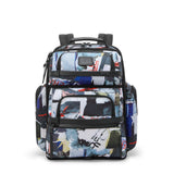 Tumi Alpha Brief Pack backpack showing multiple compartments, padded shoulder straps, and sleek black design suitable for travel and work.