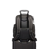 Tumi Alpha Brief Pack backpack with multiple compartments and padded shoulder straps, designed for professional and travel use.