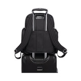 Tumi Arrivé Larson backpack in black with leather accents, featuring multiple compartments and adjustable shoulder straps.