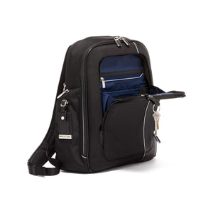 Tumi Arrivé Larson backpack with multiple compartments, black nylon material, and padded shoulder straps for comfortable carrying.