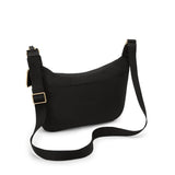 Black Tumi Voyageur Alabama crossbody sling bag with gold accents, compact and stylish for everyday use.