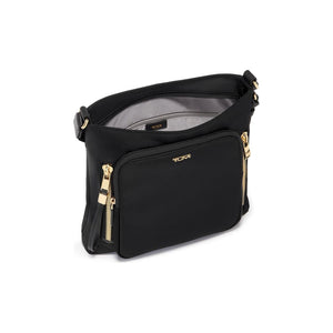 Tumi Voyageur Tyler Crossbody bag in black with adjustable strap and front zipper pocket, stylish travel accessory.