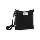 Tumi Voyageur Tyler Crossbody bag in black with adjustable strap and multiple compartments, designed for stylish everyday use.