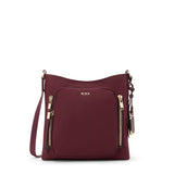 Tumi Voyageur Tyler Crossbody bag in black with adjustable strap and zipper compartments, designed for stylish everyday use.