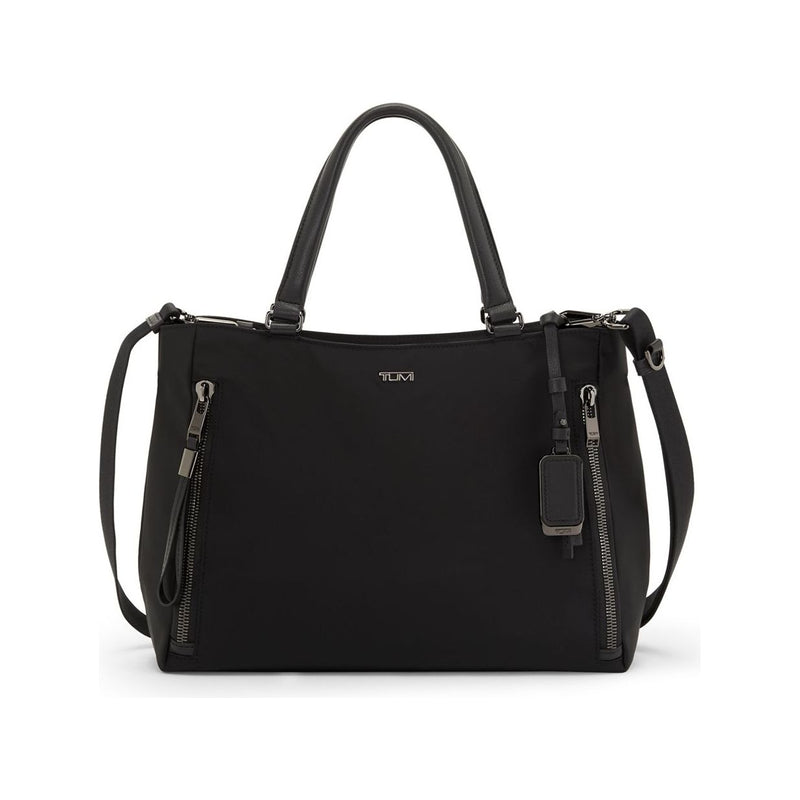 Tumi Voyageur Valetta Medium Tote in black leather with silver hardware, showing its spacious interior and stylish design.