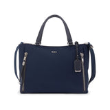 Tumi Voyageur Valetta Medium Tote in black leather with top handles and silver hardware on a neutral background.