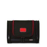 Black Tumi Alpha hanging travel kit with multiple compartments and zipper closures, designed for organized travel storage.