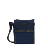 Black Tumi Alpha Pocket Small Bag with multiple compartments and adjustable strap, compact and stylish for everyday use.