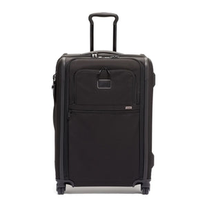 Black Tumi Alpha Short Trip expandable 4-wheeled packing case with black hardware for travel and storage.