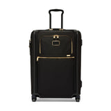 Black Tumi Alpha short trip expandable 4-wheeled packing case with black hardware, designed for easy travel and durability.