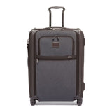 Black Tumi Alpha short trip expandable 4-wheeled packing case with black hardware, designed for travel convenience and style.