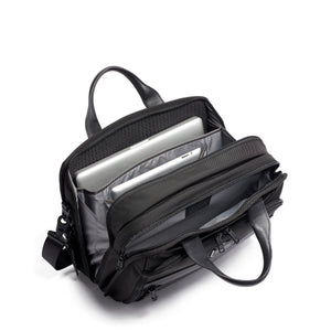Tumi Organizer Briefcase with multiple compartments, black exterior, sleek design, and durable handle for professional use.