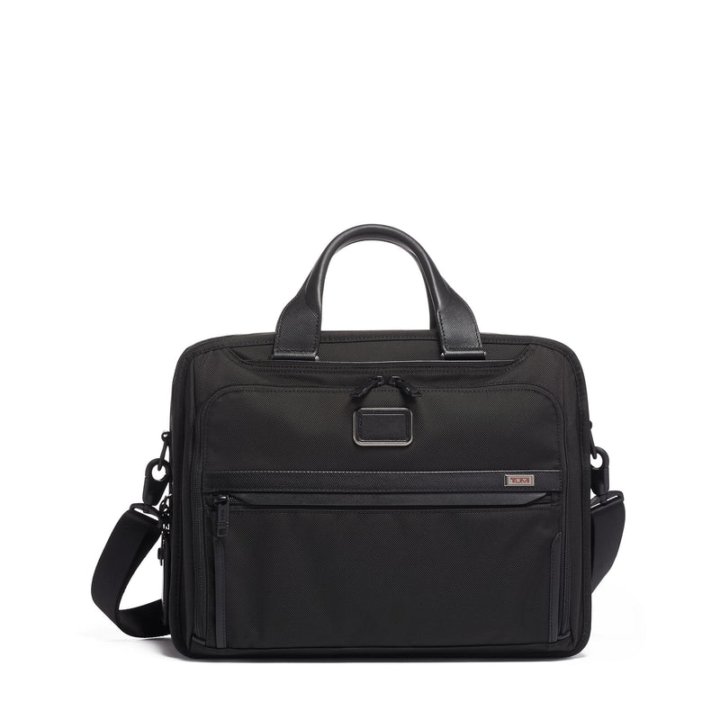 Tumi Organizer Briefcase in black with multiple compartments and handles, designed for professional organization and travel.
