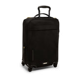 Black Tumi Voyageur Leger international carry-on luggage with gold accents, lightweight design, and durable wheels for travel.