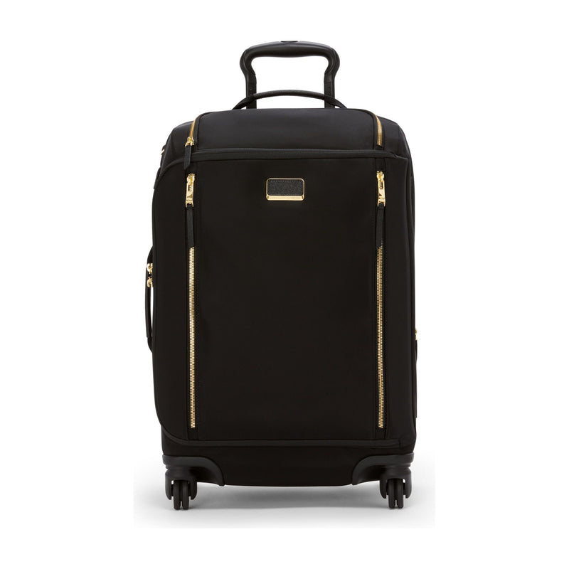Black Tumi Voyageur Leger international carry-on luggage with gold accents, lightweight design, and durable wheels for travel.