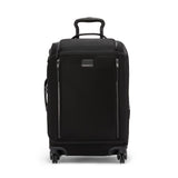 Black Tumi Voyageur Leger international carry-on luggage with gold accents, durable hard shell and compact design for travel.