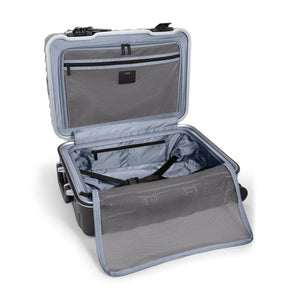 Black Tumi 19 Degree Frame international 4-wheeled carry-on luggage with textured exterior and durable design.