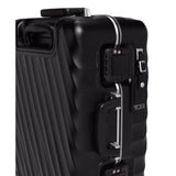 Black Tumi 19 Degree Frame international 4-wheeled carry-on luggage with textured surface and sturdy handle.