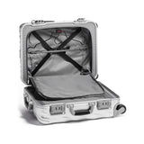 Tumi 19 Degree aluminum international carry-on luggage with four spinner wheels and sleek hard-shell design.
