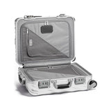 Tumi 19 Degree aluminum international carry-on luggage with sleek hard-shell design and reinforced corners.