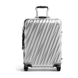 Tumi 19 Degree aluminum international carry-on luggage with sleek hard shell and telescoping handle.