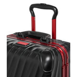 Tumi 19 Degree aluminum international carry-on luggage with four wheels and telescoping handle for easy travel.