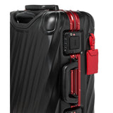 Tumi 19 Degree aluminum international carry-on luggage with four wheels and telescoping handle, sleek and durable travel case.