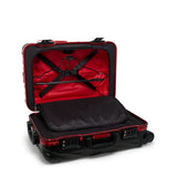 Tumi 19 Degree aluminum international carry-on luggage with four spinner wheels and telescopic handle.