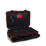 Tumi 19 Degree aluminum carry-on luggage with four wheels, black hard-shell exterior, and telescoping handle for travel.