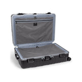 Black Tumi 19 Degree Frame checked luggage with textured surface, designed for extended trips, durable and spacious travel case.