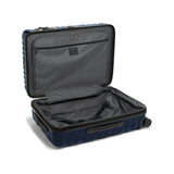 Navy Tumi 19 Degree polycarbonate checked luggage with four wheels, handle, and TSA lock for short trips.