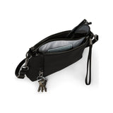 Black Tumi Voyageur Adela crossbody bag with gunmetal accents, featuring a sleek compact design and adjustable strap.