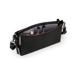 Black Tumi Voyageur Adela crossbody bag with gunmetal hardware, featuring a sleek design and adjustable strap.