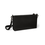 Black Tumi Voyageur Adela crossbody bag with gunmetal accents, featuring a sleek design and adjustable strap for versatile carrying.