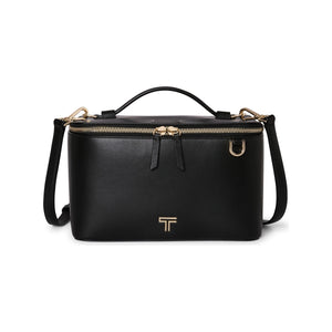 Black Tumi Voyageur Lex Train Case Crossbody bag with gold accents, featuring a compact design and adjustable strap for easy carrying.