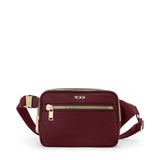 Tumi Voyageur Sedona crossbody bag with adjustable strap and multiple compartments, designed for stylish everyday use.