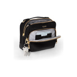 Black Tumi Voyageur Teghan Crossbody Bag with gold accents, showing its sleek design and adjustable strap.