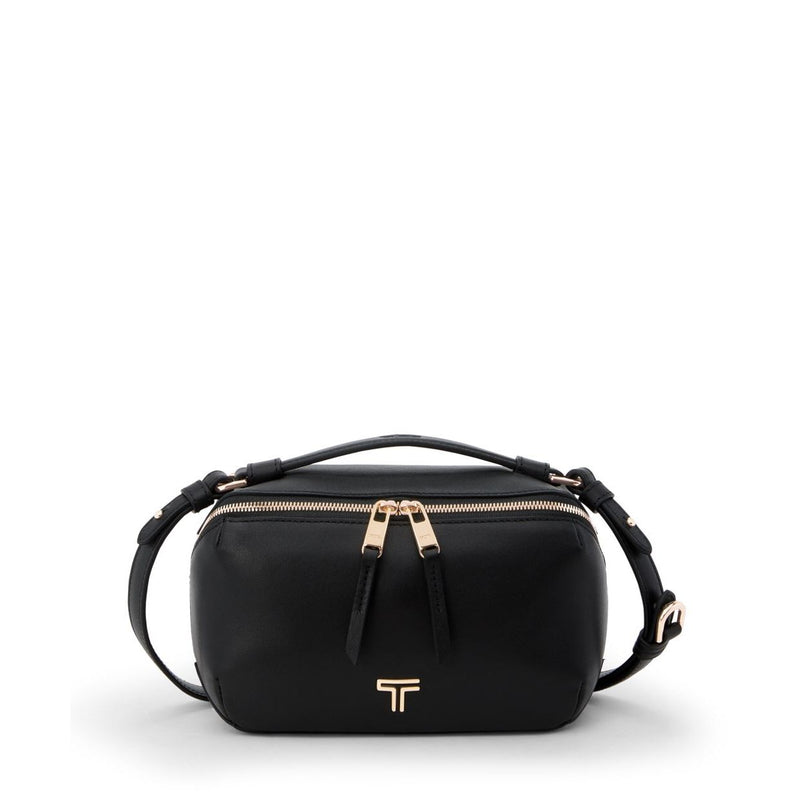 Black Tumi Voyageur Berlin crossbody bag with light gold accents, featuring adjustable strap and compact, stylish design.